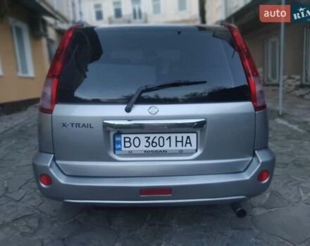 Серый Ниссан ИксТрейл, объемом двигателя 2.5 л и пробегом 225 тыс. км за 5900 $, фото 3 на Automoto.ua