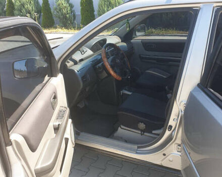 Сірий Ніссан ІксТрейл, об'ємом двигуна 2 л та пробігом 396 тис. км за 6499 $, фото 33 на Automoto.ua