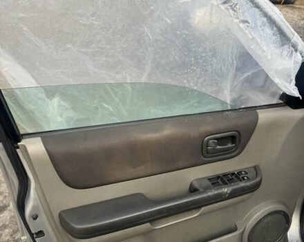 Серый Ниссан ИксТрейл, объемом двигателя 2.5 л и пробегом 250 тыс. км за 3899 $, фото 15 на Automoto.ua