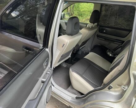 Серый Ниссан ИксТрейл, объемом двигателя 2.2 л и пробегом 240 тыс. км за 3100 $, фото 12 на Automoto.ua