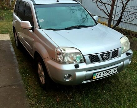 Серый Ниссан ИксТрейл, объемом двигателя 2 л и пробегом 210 тыс. км за 4500 $, фото 1 на Automoto.ua