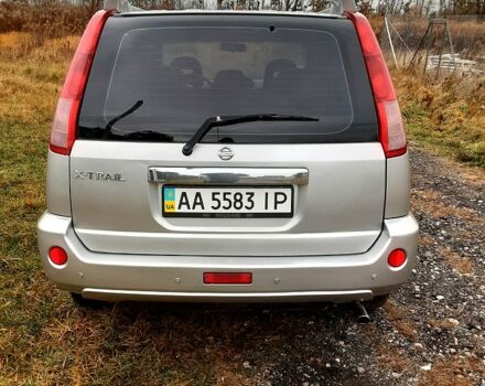 Серый Ниссан ИксТрейл, объемом двигателя 2 л и пробегом 210 тыс. км за 4500 $, фото 2 на Automoto.ua