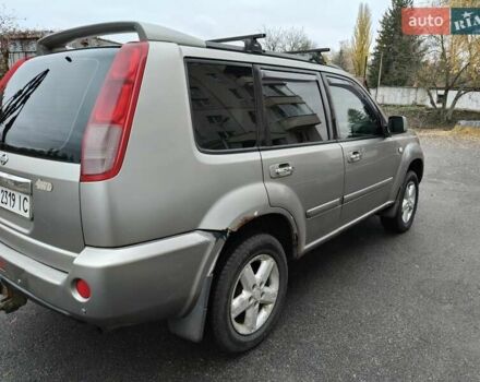 Серый Ниссан ИксТрейл, объемом двигателя 2 л и пробегом 270 тыс. км за 4196 $, фото 4 на Automoto.ua