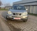 Серый Ниссан ИксТрейл, объемом двигателя 2.2 л и пробегом 300 тыс. км за 4999 $, фото 1 на Automoto.ua