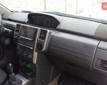 Сірий Ніссан ІксТрейл, об'ємом двигуна 2 л та пробігом 290 тис. км за 6000 $, фото 10 на Automoto.ua