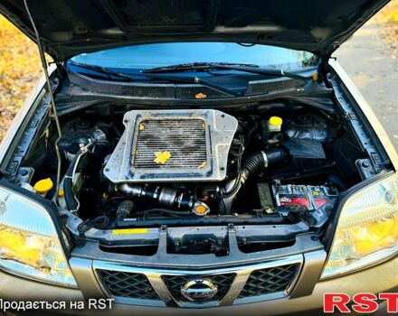 Серый Ниссан ИксТрейл, объемом двигателя 2.2 л и пробегом 238 тыс. км за 4250 $, фото 6 на Automoto.ua