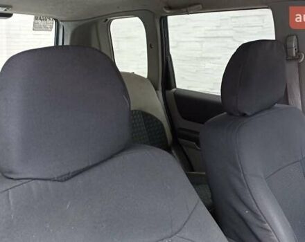 Сірий Ніссан ІксТрейл, об'ємом двигуна 2 л та пробігом 290 тис. км за 6000 $, фото 9 на Automoto.ua