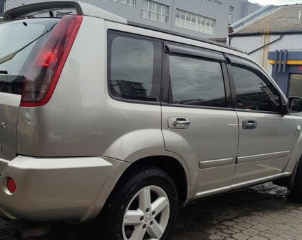 Серый Ниссан ИксТрейл, объемом двигателя 2.2 л и пробегом 293 тыс. км за 4000 $, фото 2 на Automoto.ua