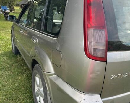 Серый Ниссан ИксТрейл, объемом двигателя 2.2 л и пробегом 370 тыс. км за 3500 $, фото 2 на Automoto.ua