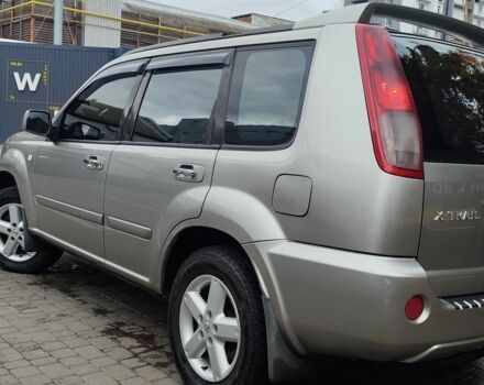 Серый Ниссан ИксТрейл, объемом двигателя 2.2 л и пробегом 293 тыс. км за 4000 $, фото 3 на Automoto.ua