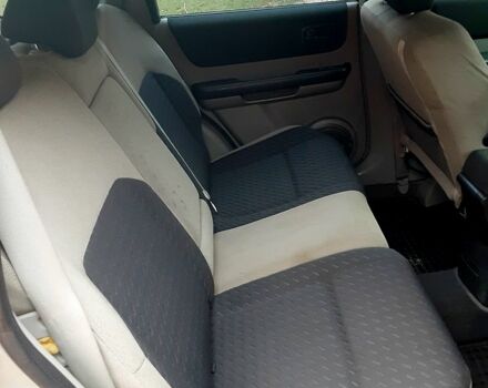 Серый Ниссан ИксТрейл, объемом двигателя 2 л и пробегом 210 тыс. км за 4500 $, фото 9 на Automoto.ua