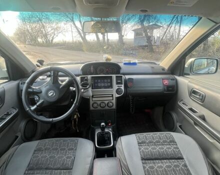 Серый Ниссан ИксТрейл, объемом двигателя 2.2 л и пробегом 300 тыс. км за 4999 $, фото 5 на Automoto.ua