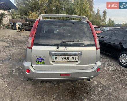 Серый Ниссан ИксТрейл, объемом двигателя 2.5 л и пробегом 250 тыс. км за 3899 $, фото 4 на Automoto.ua