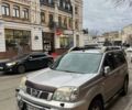 Серый Ниссан ИксТрейл, объемом двигателя 2.49 л и пробегом 250 тыс. км за 7800 $, фото 2 на Automoto.ua