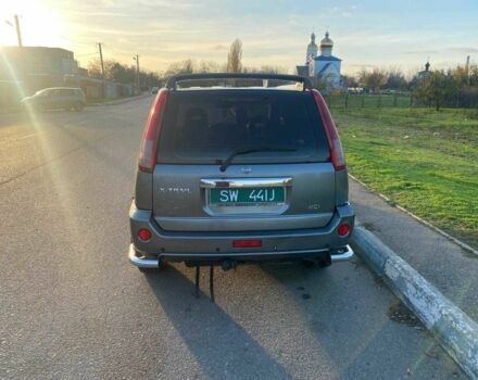 Серый Ниссан ИксТрейл, объемом двигателя 2.2 л и пробегом 337 тыс. км за 4700 $, фото 2 на Automoto.ua