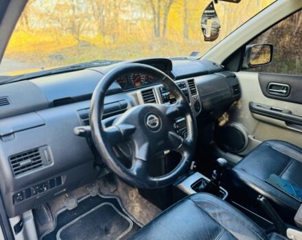 Серый Ниссан ИксТрейл, объемом двигателя 2.2 л и пробегом 238 тыс. км за 4250 $, фото 10 на Automoto.ua