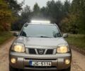 Сірий Ніссан ІксТрейл, об'ємом двигуна 2 л та пробігом 317 тис. км за 4000 $, фото 1 на Automoto.ua