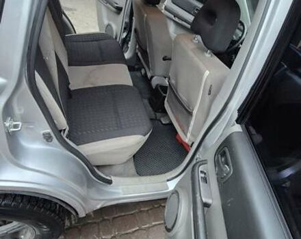 Серый Ниссан ИксТрейл, объемом двигателя 2.2 л и пробегом 490 тыс. км за 6000 $, фото 3 на Automoto.ua