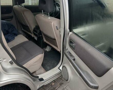 Серый Ниссан ИксТрейл, объемом двигателя 2.2 л и пробегом 302 тыс. км за 4999 $, фото 4 на Automoto.ua