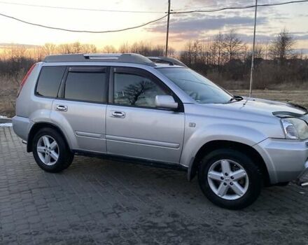 Серый Ниссан ИксТрейл, объемом двигателя 2.49 л и пробегом 261 тыс. км за 5700 $, фото 2 на Automoto.ua