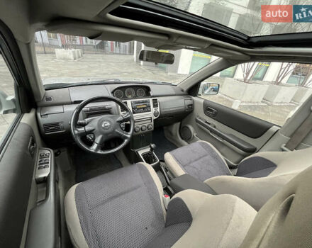 Серый Ниссан ИксТрейл, объемом двигателя 2.2 л и пробегом 299 тыс. км за 3800 $, фото 12 на Automoto.ua