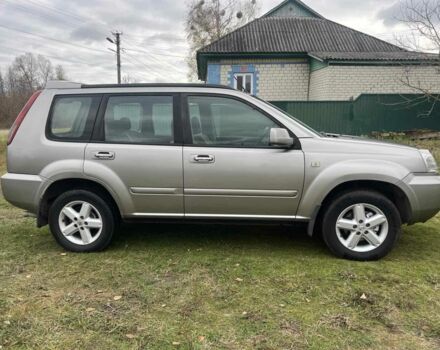 Серый Ниссан ИксТрейл, объемом двигателя 2.2 л и пробегом 261 тыс. км за 4400 $, фото 2 на Automoto.ua