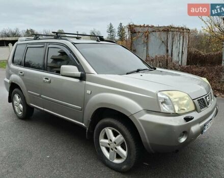 Серый Ниссан ИксТрейл, объемом двигателя 2 л и пробегом 270 тыс. км за 4196 $, фото 3 на Automoto.ua