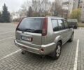 Серый Ниссан ИксТрейл, объемом двигателя 2.2 л и пробегом 308 тыс. км за 3600 $, фото 5 на Automoto.ua