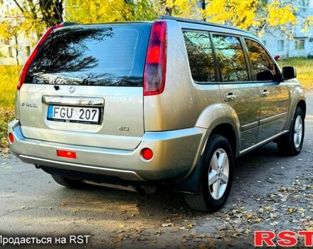 Серый Ниссан ИксТрейл, объемом двигателя 2.2 л и пробегом 238 тыс. км за 4250 $, фото 3 на Automoto.ua