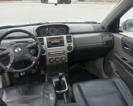 Серый Ниссан ИксТрейл, объемом двигателя 2.2 л и пробегом 290 тыс. км за 3700 $, фото 6 на Automoto.ua