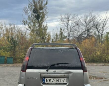 Серый Ниссан ИксТрейл, объемом двигателя 2.2 л и пробегом 250 тыс. км за 3500 $, фото 4 на Automoto.ua