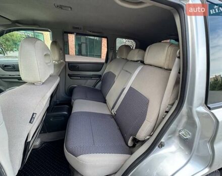 Серый Ниссан ИксТрейл, объемом двигателя 2 л и пробегом 209 тыс. км за 6800 $, фото 12 на Automoto.ua