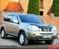Сірий Ніссан ІксТрейл, об'ємом двигуна 2 л та пробігом 240 тис. км за 6250 $, фото 7 на Automoto.ua