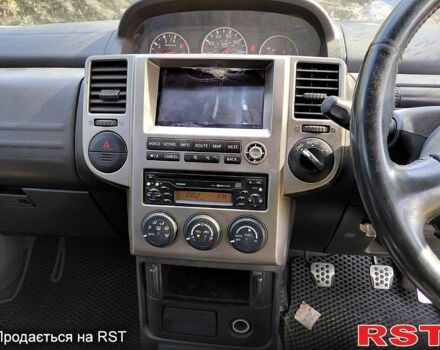 Серый Ниссан ИксТрейл, объемом двигателя 2.2 л и пробегом 179 тыс. км за 3320 $, фото 8 на Automoto.ua