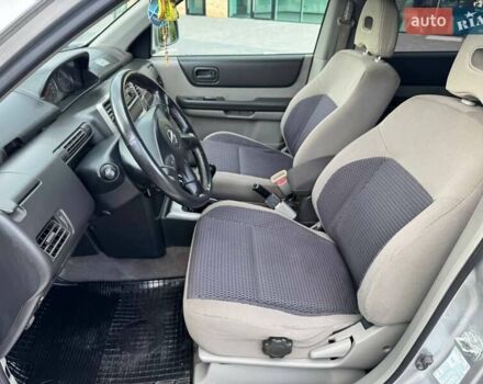 Серый Ниссан ИксТрейл, объемом двигателя 2 л и пробегом 209 тыс. км за 6800 $, фото 17 на Automoto.ua