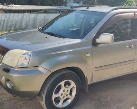 Серый Ниссан ИксТрейл, объемом двигателя 2 л и пробегом 350 тыс. км за 7200 $, фото 1 на Automoto.ua