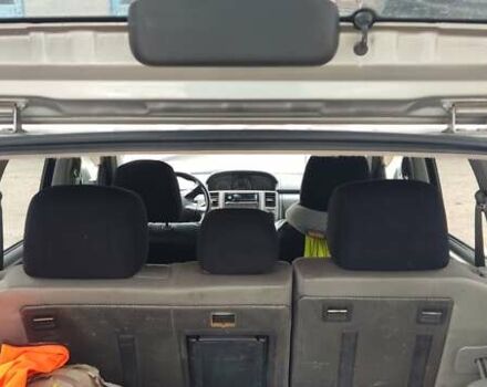 Серый Ниссан ИксТрейл, объемом двигателя 2 л и пробегом 350 тыс. км за 7200 $, фото 5 на Automoto.ua