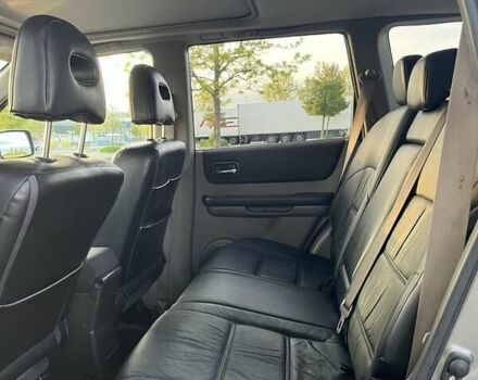 Серый Ниссан ИксТрейл, объемом двигателя 2.5 л и пробегом 360 тыс. км за 6417 $, фото 12 на Automoto.ua