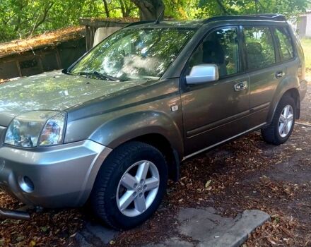 Серый Ниссан ИксТрейл, объемом двигателя 2.2 л и пробегом 255 тыс. км за 4000 $, фото 3 на Automoto.ua