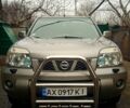 Сірий Ніссан ІксТрейл, об'ємом двигуна 2 л та пробігом 300 тис. км за 4500 $, фото 1 на Automoto.ua