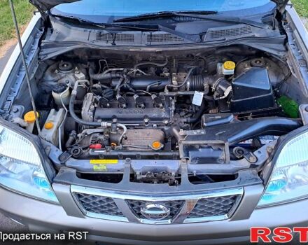 Серый Ниссан ИксТрейл, объемом двигателя 2 л и пробегом 214 тыс. км за 6585 $, фото 8 на Automoto.ua