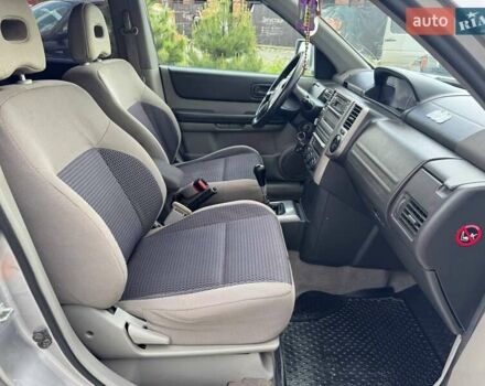 Серый Ниссан ИксТрейл, объемом двигателя 2 л и пробегом 209 тыс. км за 6800 $, фото 16 на Automoto.ua