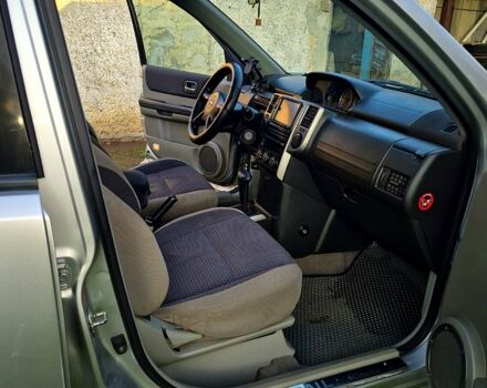 Серый Ниссан ИксТрейл, объемом двигателя 2 л и пробегом 208 тыс. км за 7300 $, фото 6 на Automoto.ua