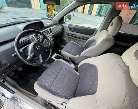 Серый Ниссан ИксТрейл, объемом двигателя 2 л и пробегом 209 тыс. км за 6800 $, фото 18 на Automoto.ua