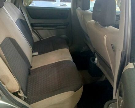 Серый Ниссан ИксТрейл, объемом двигателя 2.2 л и пробегом 255 тыс. км за 4000 $, фото 5 на Automoto.ua