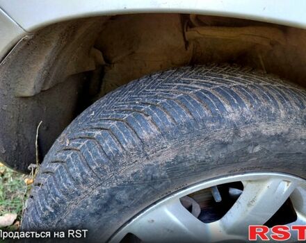 Серый Ниссан ИксТрейл, объемом двигателя 2.2 л и пробегом 179 тыс. км за 3320 $, фото 2 на Automoto.ua