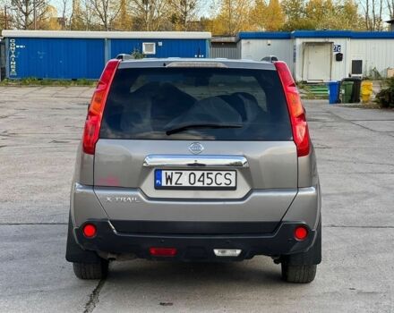 Серый Ниссан ИксТрейл, объемом двигателя 2 л и пробегом 210 тыс. км за 3450 $, фото 5 на Automoto.ua