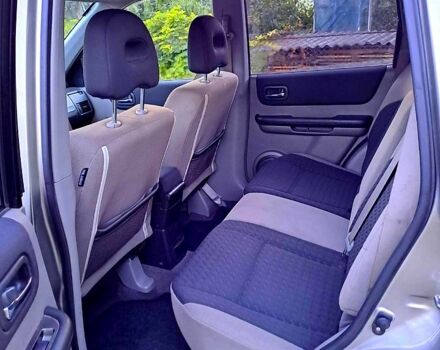 Серый Ниссан ИксТрейл, объемом двигателя 2 л и пробегом 214 тыс. км за 6585 $, фото 5 на Automoto.ua