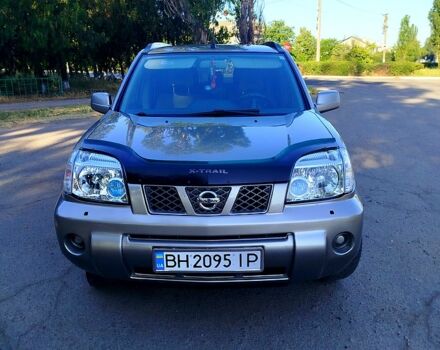 Серый Ниссан ИксТрейл, объемом двигателя 2 л и пробегом 240 тыс. км за 4200 $, фото 5 на Automoto.ua