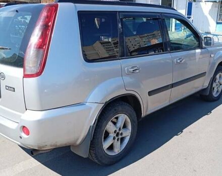 Серый Ниссан ИксТрейл, объемом двигателя 2 л и пробегом 239 тыс. км за 5800 $, фото 2 на Automoto.ua